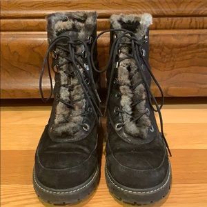 Stuart Weitzman combat boots fully lined in fur